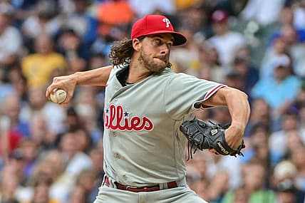 Sep 2, 2023; Milwaukee, Wisconsin, USA;  Philadelphia Phillies pitcher Aaron Nola (27) pitches in the first inning against the Milwaukee Brewers at American Family Field. Mandatory Credit: Benny Sieu-USA TODAY Sports