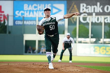 Sep 2, 2023; Denver, Colorado, USA; Colorado Rockies starting pitcher Ty Blach (50) delivers against the Toronto Blue Jays in the first inning at Coors Field. Mandatory Credit: Ron Chenoy-USA TODAY Sports