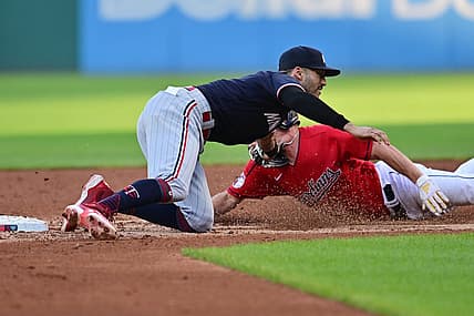 Sep 5, 2023; Cleveland, Ohio, USA; Cleveland Guardians center fielder Myles Straw (7) is caught stealing by Minnesota Twins shortstop Carlos Correa (4) during the third inning at Progressive Field. Mandatory Credit: Ken Blaze-USA TODAY Sports
