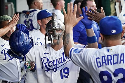 Sep 5, 2023; Kansas City, Missouri, USA; Kansas City Royals second baseman Michael Massey (19) is congratulated in the dugout after hitting a home run against the Chicago White Sox in the fourth inning at Kauffman Stadium. Mandatory Credit: Denny Medley-USA TODAY Sports