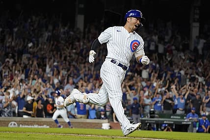 Sep 5, 2023; Chicago, Illinois, USA; Chicago Cubs right fielder Seiya Suzuki (27) hits a two-run home run against the San Francisco Giants during the seventh inning at Wrigley Field. Mandatory Credit: David Banks-USA TODAY Sports