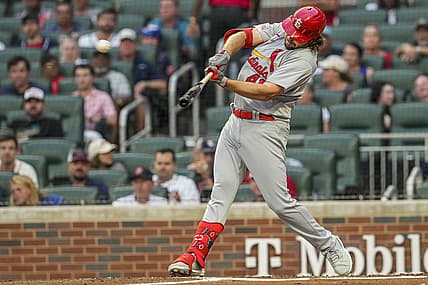 Sep 6, 2023; Cumberland, Georgia, USA; St. Louis Cardinals designated hitter Alec Burleson (41) singles before being thrown out trying to stretch to a double second baseman Nolan Gorman (16) against the Atlanta Braves during the first inning at Truist Park. Mandatory Credit: Dale Zanine-USA TODAY Sports