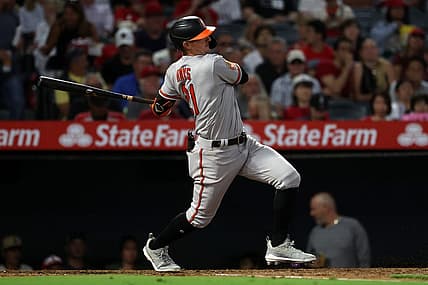 Sep 6, 2023; Anaheim, California, USA;  Baltimore Orioles left fielder Austin Hays (21) hits an RBI single during the third inning against the Los Angeles Angels at Angel Stadium. Mandatory Credit: Kiyoshi Mio-USA TODAY Sports