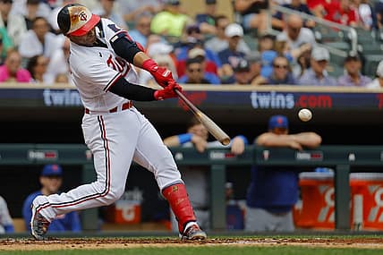 Sep 9, 2023; Minneapolis, Minnesota, USA; Minnesota Twins first baseman Donovan Solano (39) hits a two-run single against the New York Mets in the second inning at Target Field. Mandatory Credit: Bruce Kluckhohn-USA TODAY Sports