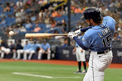 Sep 10, 2023; St. Petersburg, Florida, USA; Tampa Bay Rays right fielder Josh Lowe (15) hits a RBI double in the first inning against the Seattle Mariners  at Tropicana Field. Mandatory Credit: Jonathan Dyer-USA TODAY Sports