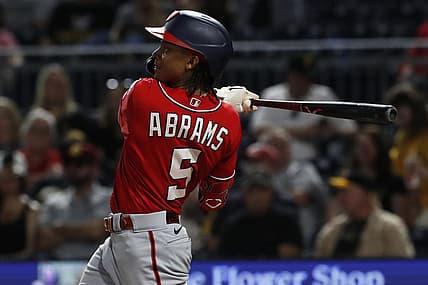 Sep 11, 2023; Pittsburgh, Pennsylvania, USA;  Washington Nationals shortstop CJ Abrams (5) hits a solo home run  against the Pittsburgh Pirates during the seventh inning at PNC Park. Mandatory Credit: Charles LeClaire-USA TODAY Sports