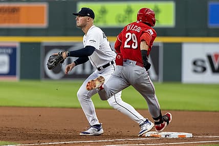 Sep 13, 2023; Detroit, Michigan, USA; Cincinnati Reds center fielder TJ Friedl (29) beats the throw to Detroit Tigers first baseman Spencer Torkelson (20) in the fourth inning at Comerica Park. Mandatory Credit: David Reginek-USA TODAY Sports