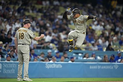 Sep 13, 2023; Los Angeles, California, USA; San Diego Padres left fielder Juan Soto (22) celebrates with third base coach and infield instructor Matt Williams (18) after hitting a home riun in the first inning against the Los Angeles Dodgers at Dodger Stadium. Mandatory Credit: Kirby Lee-USA TODAY Sports