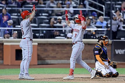 Sep 15, 2023; New York City, New York, USA; Cincinnati Reds first baseman Spencer Steer (7) celebrates his two run home run against the New York Mets with third baseman Nick Senzel (15) during the sixth inning at Citi Field. Mandatory Credit: Brad Penner-USA TODAY Sports