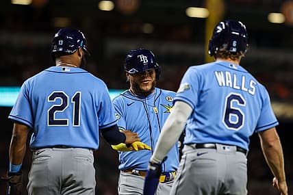 Sep 15, 2023; Baltimore, Maryland, USA; Tampa Bay Rays designated hitter Harold Ramirez (43) celebrates with center fielder Manuel Margot (13) and third baseman Taylor Walls (6) after hitting a three run home run against the Baltimore Orioles during the sixth inning at Oriole Park at Camden Yards. Mandatory Credit: Scott Taetsch-USA TODAY Sports