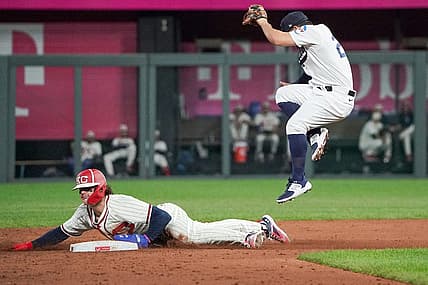 Sep 16, 2023; Kansas City, Missouri, USA; Houston Astros second baseman Jose Altuve (27) can   t make the tag as Kansas City Royals shortstop Bobby Witt Jr. (7) steals second base in the third inning at Kauffman Stadium. Mandatory Credit: Denny Medley-USA TODAY Sports