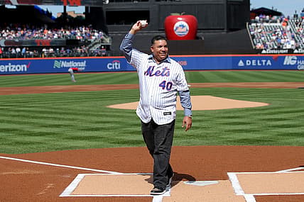 Sep 17, 2023; New York City, New York, USA; New York Mets former pitcher Bartolo Colon waves after throwing out a ceremonial first pitch before a game against the Cincinnati Reds at Citi Field. Colon today retired from baseball as a Met. Mandatory Credit: Brad Penner-USA TODAY Sports