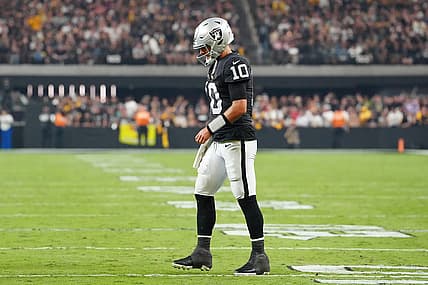 Sep 24, 2023; Paradise, Nevada, USA; Las Vegas Raiders quarterback Jimmy Garoppolo (10) walks back to the huddle after being knocked to the ground by the Pittsburgh Steelers defense during the fourth quarter at Allegiant Stadium. Mandatory Credit: Stephen R. Sylvanie-USA TODAY Sports