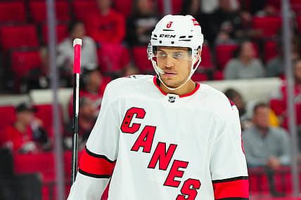 Sep 26, 2023; Raleigh, North Carolina, USA;  Carolina Hurricanes defensemen Caleb Jones (6) looks on against the Tampa Bay Lightning during the second period at PNC Arena. Mandatory Credit: James Guillory-USA TODAY Sports