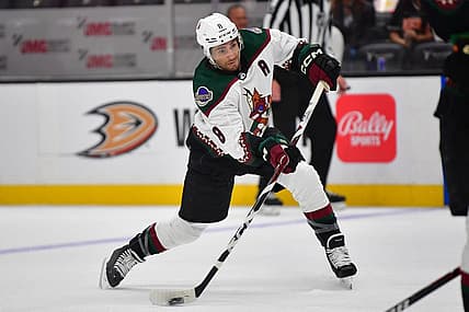Oct 5, 2023; Anaheim, California, USA; Arizona Coyotes center Nick Schmaltz (8) shoots on goal against the Anaheim Ducks during the first period at Honda Center. Mandatory Credit: Gary A. Vasquez-USA TODAY Sports