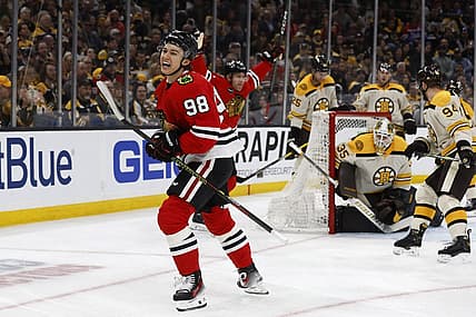 Oct 11, 2023; Boston, Massachusetts, USA; Chicago Blackhawks center Connor Bedard (98) celebrates after scoring his first NHL goal on Boston Bruins goaltender Linus Ullmark (35) during the first period at TD Garden. Mandatory Credit: Winslow Townson-USA TODAY Sports
