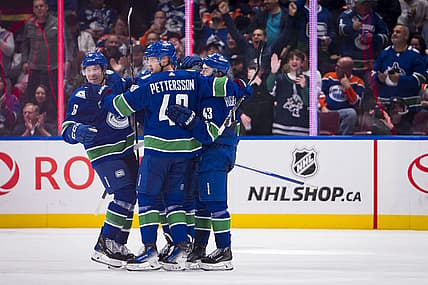 Oct 11, 2023; Vancouver, British Columbia, CAN; Vancouver Canucks forward Brock Boeser (6) and forward Elias Pettersson (40) and defenseman Quinn Hughes (43) and forward J.T. Miller (9) celebrate Pettersson   s goal against the Edmonton Oilers in the second period at Rogers Arena. Mandatory Credit: Bob Frid-USA TODAY Sports