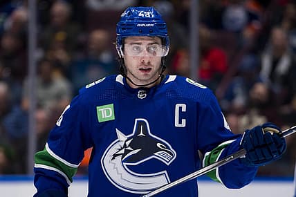 Oct 11, 2023; Vancouver, British Columbia, CAN; Vancouver Canucks defenseman Quinn Hughes (43) during a stop in play against the Edmonton Oilers in the second period at Rogers Arena. Mandatory Credit: Bob Frid-USA TODAY Sports