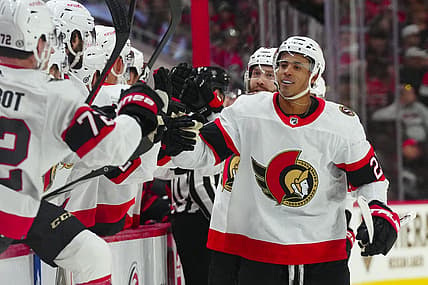 Oct 11, 2023; Raleigh, North Carolina, USA; Ottawa Senators right wing Mathieu Joseph (21) celebrates his goal against the Carolina Hurricanes during the first period at PNC Arena. Mandatory Credit: James Guillory-USA TODAY Sports