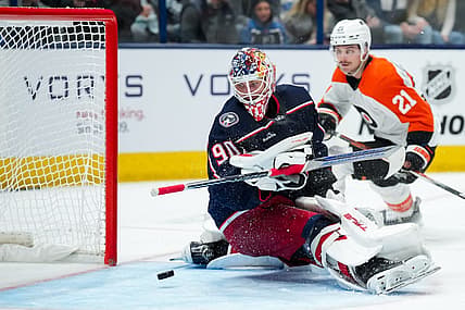 Oct 12, 2023; Columbus, Ohio, USA;  Columbus Blue Jackets goaltender Elvis Merzlikins (90) makes a save in net against the Philadelphia Flyers in the second period at Nationwide Arena. Mandatory Credit: Aaron Doster-USA TODAY Sports