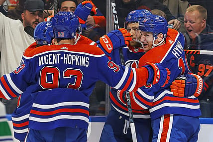 Oct 14, 2023; Edmonton, Alberta, CAN; The Edmonton Oilers celebrate a goal scored by forward Leon Draisaitl (29) during the first period against the Vancouver Canucks at Rogers Place. Mandatory Credit: Perry Nelson-USA TODAY Sports
