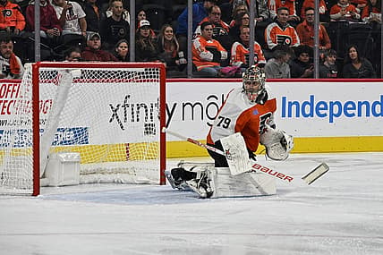 Oct 17, 2023; Philadelphia, Pennsylvania, USA; Philadelphia Flyers goaltender Carter Hart (79) watches as shot goes into the corner in the second period against the Vancouver Canucks at the Wells Fargo Center. Mandatory Credit: John Geliebter-USA TODAY Sports