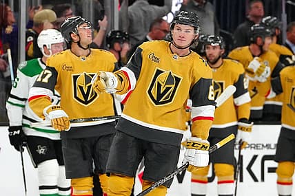 Oct 17, 2023; Las Vegas, Nevada, USA; Vegas Golden Knights defenseman Kaedan Korczak (6) gestures towards Vegas Golden Knights goaltender Adin Hill (33) after scoring a goal against the Dallas Stars during the second period at T-Mobile Arena. Mandatory Credit: Stephen R. Sylvanie-USA TODAY Sports