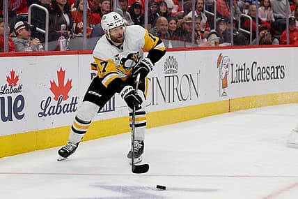 Oct 18, 2023; Detroit, Michigan, USA; Pittsburgh Penguins right wing Bryan Rust (17) skates with the puck in the third period against the Detroit Red Wings at Little Caesars Arena. Mandatory Credit: Rick Osentoski-USA TODAY Sports