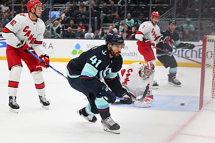 Oct 19, 2023; Seattle, Washington, USA; Seattle Kraken left wing Pierre-Edouard Bellemare (41) scores a goal past Carolina Hurricanes goaltender Antti Raanta (32) during the first period at Climate Pledge Arena. Mandatory Credit: Steven Bisig-USA TODAY Sports