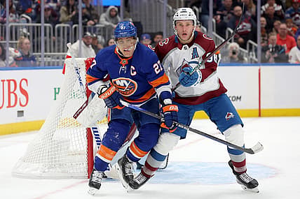 Oct 24, 2023; Elmont, New York, USA; New York Islanders left wing Anders Lee (27) fights for position against Colorado Avalanche right wing Mikko Rantanen (96) during the second period at UBS Arena. Mandatory Credit: Brad Penner-USA TODAY Sports