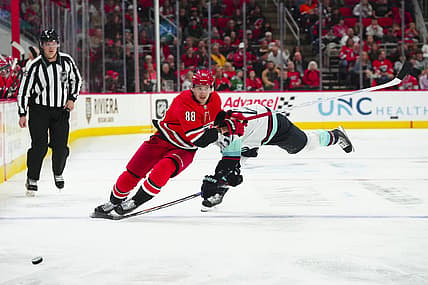 Oct 26, 2023; Raleigh, North Carolina, USA; Carolina Hurricanes center Martin Necas (88) skates after the puck against the Seattle Kraken during the third period at PNC Arena. Mandatory Credit: James Guillory-USA TODAY Sports