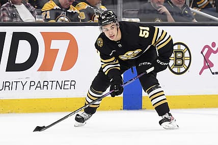 Oct 26, 2023; Boston, Massachusetts, USA; Boston Bruins center Matthew Poitras (51) skates with the puck during the third period against the Anaheim Ducks at TD Garden. Mandatory Credit: Bob DeChiara-USA TODAY Sports