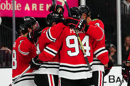 Oct 27, 2023; Las Vegas, Nevada, USA; Chicago Blackhawks players celebrate after defeating the Vegas Golden Knights 4-3 in overtime at T-Mobile Arena. Mandatory Credit: Stephen R. Sylvanie-USA TODAY Sports