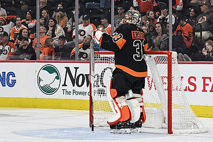 Oct 28, 2023; Philadelphia, Pennsylvania, USA; Philadelphia Flyers goaltender Samuel Ersson (33) watches a replay of a goal scored on him during the third period against the Anaheim Ducks at Wells Fargo Center. Anaheim won 7-4. Mandatory Credit: John Geliebter-USA TODAY Sports