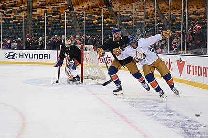 Oct 28, 2023; Edmonton, Alberta, Canada; Edmonton Oilers left winger Evander Kane (91) with Oilers defenceman Mattias Ekholm (14) are seen out on the ice during practice day for the 2023 Heritage Classic ice hockey game at Commonwealth Stadium. Mandatory Credit: Walter Tychnowicz-USA TODAY Sports