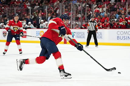 Oct 28, 2023; Sunrise, Florida, USA; Florida Panthers center Carter Verhaeghe (23) shoots the puck against the Seattle Kraken during the second period at Amerant Bank Arena. Mandatory Credit: Jasen Vinlove-USA TODAY Sports