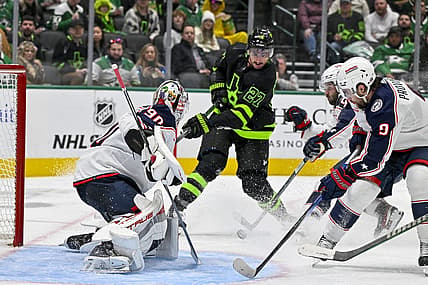 Oct 30, 2023; Dallas, Texas, USA; Columbus Blue Jackets goaltender Elvis Merzlikins (90) stops a shot by Dallas Stars left wing Mason Marchment (27) during the second period at the American Airlines Center. Mandatory Credit: Jerome Miron-USA TODAY Sports
