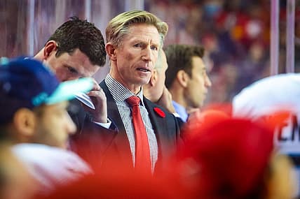 Nov 1, 2022; Calgary, Alberta, CAN; Seattle Kraken head coach Dave Hakstol on his bench against the Calgary Flames during the second period at Scotiabank Saddledome. Mandatory Credit: Sergei Belski-USA TODAY Sports