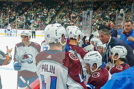 Sep 28, 2023; Saint Paul, Minnesota, USA; Colorado Avalanche head coach Jared Bednar talks with the team during a break against the Minnesota Wild in the third period at Xcel Energy Center. Mandatory Credit: Matt Blewett-USA TODAY Sports
