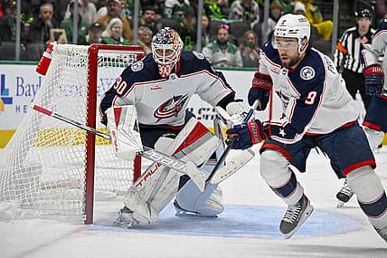 Oct 30, 2023; Dallas, Texas, USA; Columbus Blue Jackets goaltender Elvis Merzlikins (90) and defenseman Ivan Provorov (9) faces the Dallas Stars attack during the second period at the American Airlines Center. Mandatory Credit: Jerome Miron-USA TODAY Sports
