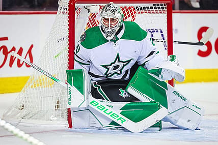 Nov 1, 2023; Calgary, Alberta, CAN; Dallas Stars goaltender Jake Oettinger (29) guards his net against the Calgary Flames during the second period at Scotiabank Saddledome. Mandatory Credit: Sergei Belski-USA TODAY Sports