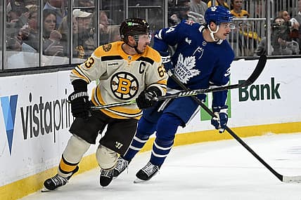 Nov 2, 2023; Boston, Massachusetts, USA; Boston Bruins left wing Brad Marchand (63) skates against Toronto Maple Leafs defenseman Morgan Rielly (44) during the third period at the TD Garden. Mandatory Credit: Brian Fluharty-USA TODAY Sports