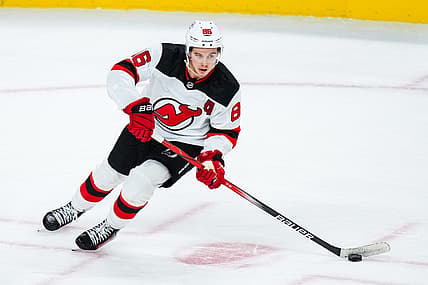 Nov 2, 2023; Saint Paul, Minnesota, USA; New Jersey Devils center Jack Hughes (86) carries the puck during the third period against the Minnesota Wild at Xcel Energy Center. Mandatory Credit: Brace Hemmelgarn-USA TODAY Sports