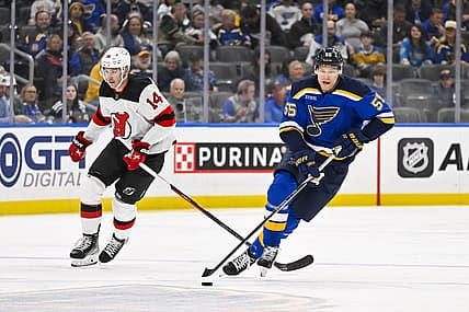 Nov 3, 2023; St. Louis, Missouri, USA;  St. Louis Blues defenseman Colton Parayko (55) controls the puck against the New Jersey Devils during the second period at Enterprise Center. Mandatory Credit: Jeff Curry-USA TODAY Sports