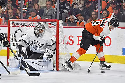 Nov 4, 2023; Philadelphia, Pennsylvania, USA; Philadelphia Flyers right wing Garnet Hathaway (19) tries to control the puck against Los Angeles Kings goaltender Cam Talbot (39) during the second period at Wells Fargo Center. Mandatory Credit: Eric Hartline-USA TODAY Sports
