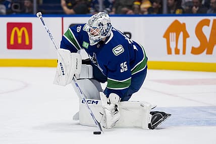 Nov 4, 2023; Vancouver, British Columbia, CAN; Vancouver Canucks goalie Thatcher Demko (35) handles the puck against the Dallas Stars in the second period at Rogers Arena. Mandatory Credit: Bob Frid-USA TODAY Sports