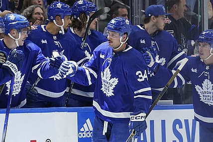 Nov 6, 2023; Toronto, Ontario, CAN; Toronto Maple Leafs forward Auston Matthews (34) celebrates with teammates after a goal against the Tampa Bay Lightning during the second period at Scotiabank Arena. Mandatory Credit: John E. Sokolowski-USA TODAY Sports