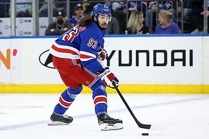 Nov 7, 2023; New York, New York, USA; New York Rangers center Mika Zibanejad (93) controls the puck against the Detroit Red Wings during the first period at Madison Square Garden. Mandatory Credit: Brad Penner-USA TODAY Sports