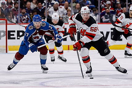 Nov 7, 2023; Denver, Colorado, USA; New Jersey Devils left wing Erik Haula (56) controls the puck ahead of Colorado Avalanche left wing Jonathan Drouin (27) in the first period at Ball Arena. Mandatory Credit: Isaiah J. Downing-USA TODAY Sports