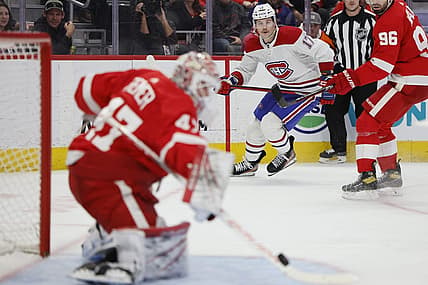 Nov 9, 2023; Detroit, Michigan, USA;  Detroit Red Wings goaltender James Reimer (47) makes a save on Montreal Canadiens right wing Josh Anderson (17) in the third period  at Little Caesars Arena. Mandatory Credit: Rick Osentoski-USA TODAY Sports